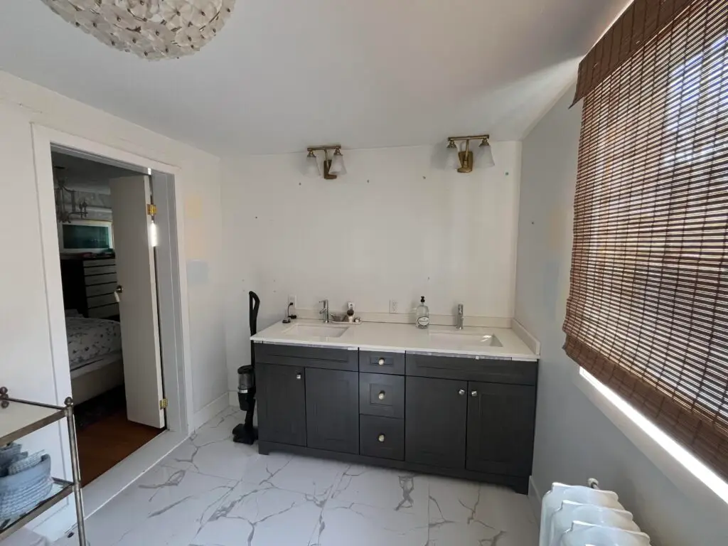 Bathroom Painting and Drywall Repair in Waterloo — trim and baseboard painting